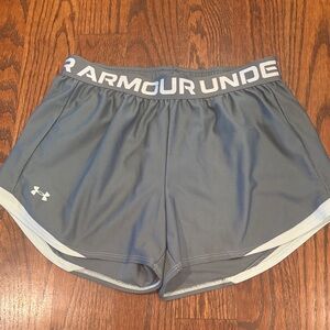 Under Armour women’s running shorts. Size S. Moss green color with mint trim.